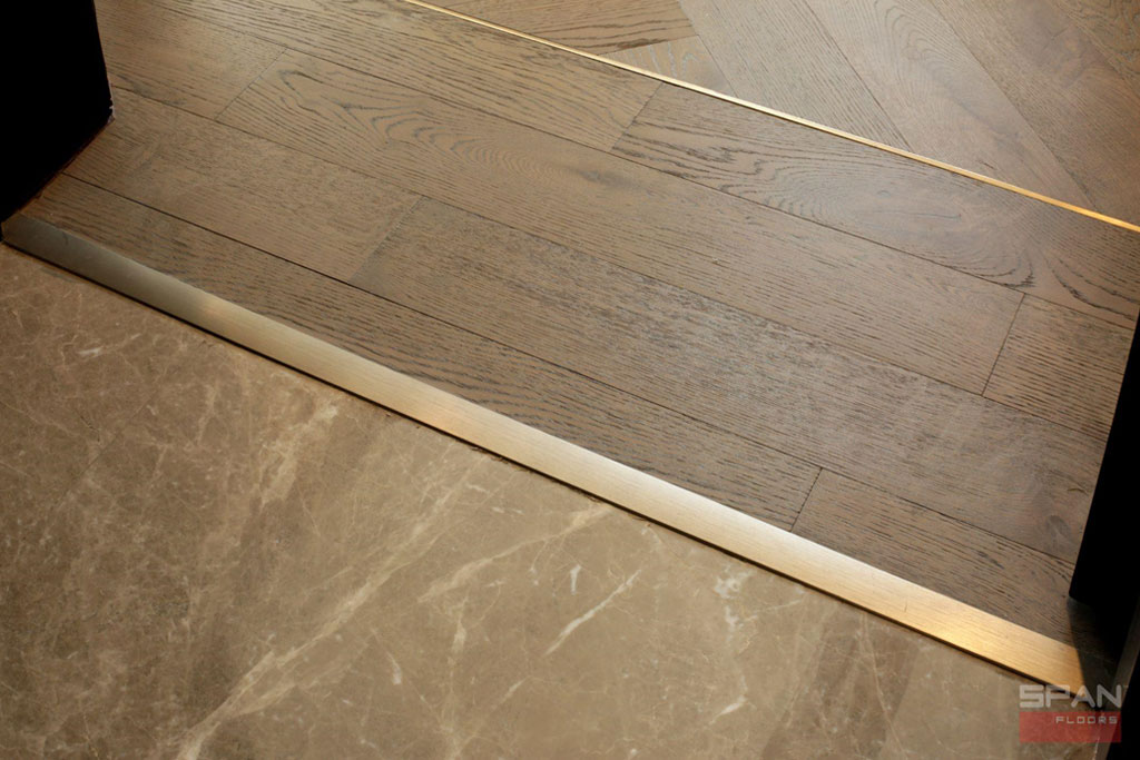 Brass Inlay Borders: A Key Element in Creating a Luxury Look in Wood Floors  - Span Floors